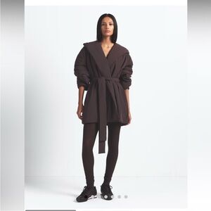 New SKIMS X Nike Woven Nylon Wrap Coat